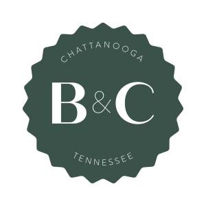 Logo of The Book & Cover, which is a dark green medallion with a large white "B & C" at its center. "Chattanooga" arcs across the top of the medallion and "Tennessee" along the bottom.
